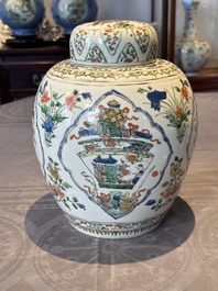 A Chinese famille verte 'figures and antiquities' jar and cover, Kangxi