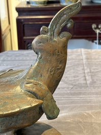 A large bronze sculpture and an opium weight in shape of Hintha or Hamsa, Burma/India, 17/18th C.