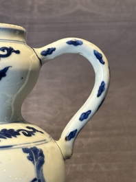 A Chinese blue and white vase with floral design and two handles, Transitional period