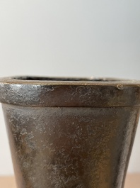 A pair of Chinese bronze 'hu' vases with Taotie design, Song/Yuan