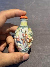 A Chinese famille rose moulded snuff bottle, Qianlong mark, late 18th/early 19th C.