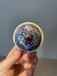 A Chinese blue, white and famille rose tea service, three famille rose bowls, a plate and a covered jar, 19th C.