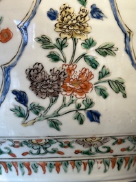 A Chinese famille verte 'figures and antiquities' jar and cover, Kangxi