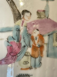 A pair of Chinese famille rose jars and covers with figures in a garden, Tongzhi mark and of the period