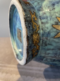 A pair of Chinese robin's egg and faux bronze-glazed 'hu' vases, Qianlong mark, 19th C.
