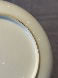 A Chinese famille rose 'erotic subject' cup and saucer, Yongzheng/Qianlong