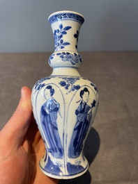 A Chinese blue and white vase, a covered bowl and six saucers, Chenghua and artemisia leaf mark, Kangxi