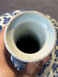 A Chinese blue and white 'lotus scroll' bottle vase, 18/19th C.