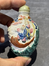 Eight Chinese moulded famille rose snuff bottles, Qianlong mark, 19th C.