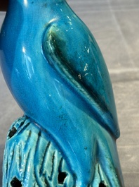 A pair of Chinese turquoise-glazed parrots, 19th C.