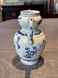 A Chinese blue and white vase with floral design and two handles, Transitional period