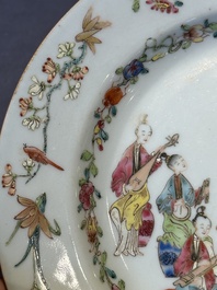 Four Chinese famille rose 'ladies playing music with children' plates, Qianlong