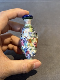 Six Chinese moulded famille rose snuff bottles, Qianlong mark, 19th C.