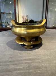 A Chinese bronze censer on stand, Wu Chen Mi Sheng Tang Zhi 戊辰米生堂制 mark, 19th C.