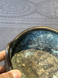 A Chinese bronze tripod censer, Guan Huai Tang Zhu Ren 冠槐堂主人 mark, 17/18th C.