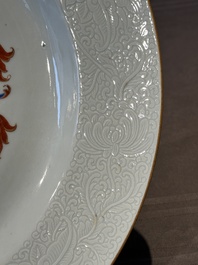 A Chinese famille rose armorial dish with incised rim for the English market with the arms of Willes Impaling Broster, Qianlong