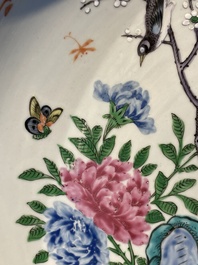 A Chinese famille verte and a famille rose dish with birds among blossom branches, 19th C.