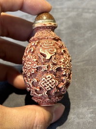 Six Chinese famille rose moulded snuff bottles, Qianlong mark, 19/20th C.