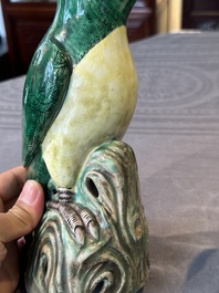 A pair of Chinese verte biscuit parrots, 19th C.