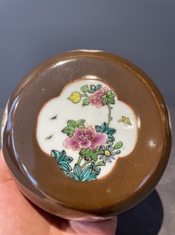 A pair of Chinese capucin-brown-ground famille rose covered jars with floral design, Yongzheng/Qianlong