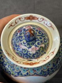 A Chinese blue, white and famille rose tea service, three famille rose bowls, a plate and a covered jar, 19th C.