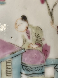 A pair of Chinese famille rose jars and covers with figures in a garden, Tongzhi mark and of the period