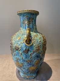 A pair of Chinese robin's egg and faux bronze-glazed 'hu' vases, Qianlong mark, 19th C.