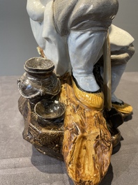 A Chinese polychrome sculpture of a lumberjack, Jingdezheng mark, 20th C.