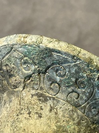Three Chinese archaic bronze wine vessels, Zhou or later