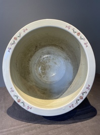 A Chinese famille rose jardiniere with ladies in a garden, 20th C.