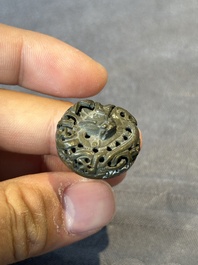 A rare Chinese monochrome teadust-glazed snuff bottle with a bronze 'dragon' stopper, 18/19th C.