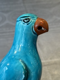 A pair of Chinese turquoise-glazed parrots, 19th C.