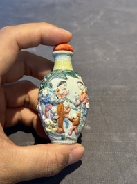 A Chinese famille rose moulded snuff bottle, Qianlong mark, late 18th/early 19th C.
