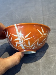 A Chinese coral-red-glazed bowl with reverse-decorated bamboo design, Xuantong mark and of the period