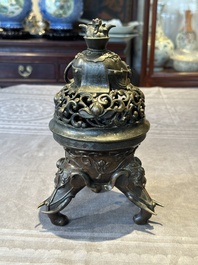 A fine Chinese tripod 'elephant' censer and cover, Ming