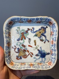 A Chinese blue, white and famille rose tea service, three famille rose bowls, a plate and a covered jar, 19th C.