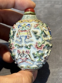 Six Chinese famille rose moulded snuff bottles, Qianlong mark, 19/20th C.