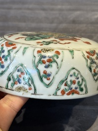 A Chinese famille verte 'figures and antiquities' jar and cover, Kangxi