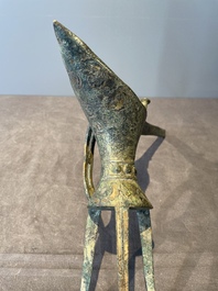 Three Chinese archaic bronze wine vessels, Zhou or later