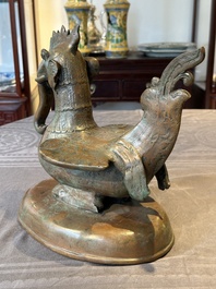 A large bronze sculpture and an opium weight in shape of Hintha or Hamsa, Burma/India, 17/18th C.