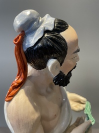 A Chinese polychrome sculpture of a lumberjack, Jingdezheng mark, 20th C.