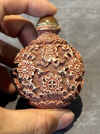 Six Chinese famille rose moulded snuff bottles, Qianlong mark, 19/20th C.