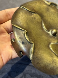 A Chinese bronze tripod censer with cover and stand, 19th C.