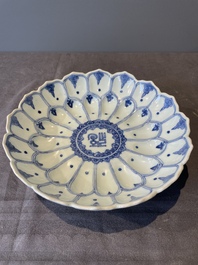 A rare Chinese lotus-shaped blue and white 'fu' dish, Kangxi mark and of the period