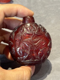 A group of seven Chinese red-overlay glass and red glass snuff bottles, 19/20th C.