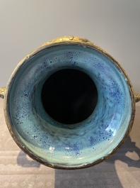 A pair of Chinese robin's egg and faux bronze-glazed 'hu' vases, Qianlong mark, 19th C.
