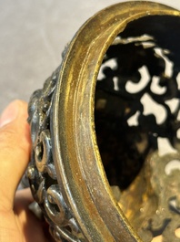 A fine Chinese tripod 'elephant' censer and cover, Ming