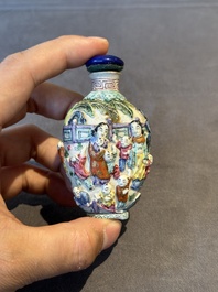 Six Chinese moulded famille rose snuff bottles, Qianlong mark, 19th C.