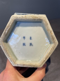 A pair of Chinese blue and white hexagonal jars and covers with a lady holding a fan, 19th C.