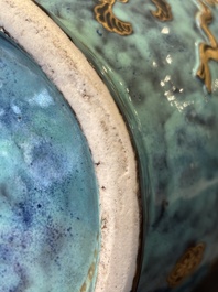 A pair of Chinese robin's egg and faux bronze-glazed 'hu' vases, Qianlong mark, 19th C.